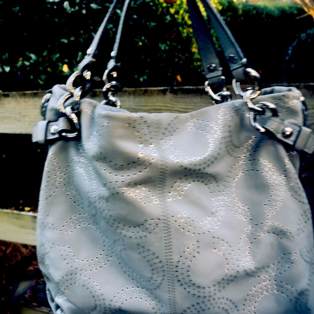 Excellent condition. SILVER and Heather grey color. COACH purse